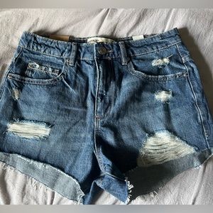 New never worn pair of super high waisted Garage shorts